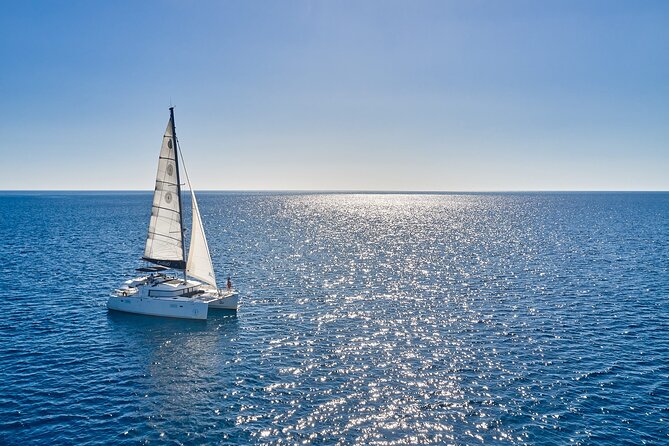 Santorini: Caldera Private Catamaran Cruise with Meal & Drinks - Nea Kameni: The Long Swim Stop, Lunch, and Volcanic Water