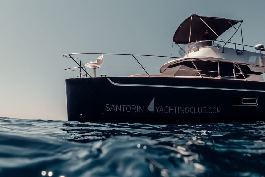 Santorini: Caldera Private Power Catamaran Cruise - Snorkel Gear, SUP, Wi-Fi, and the Comfort Side of Private Sailing