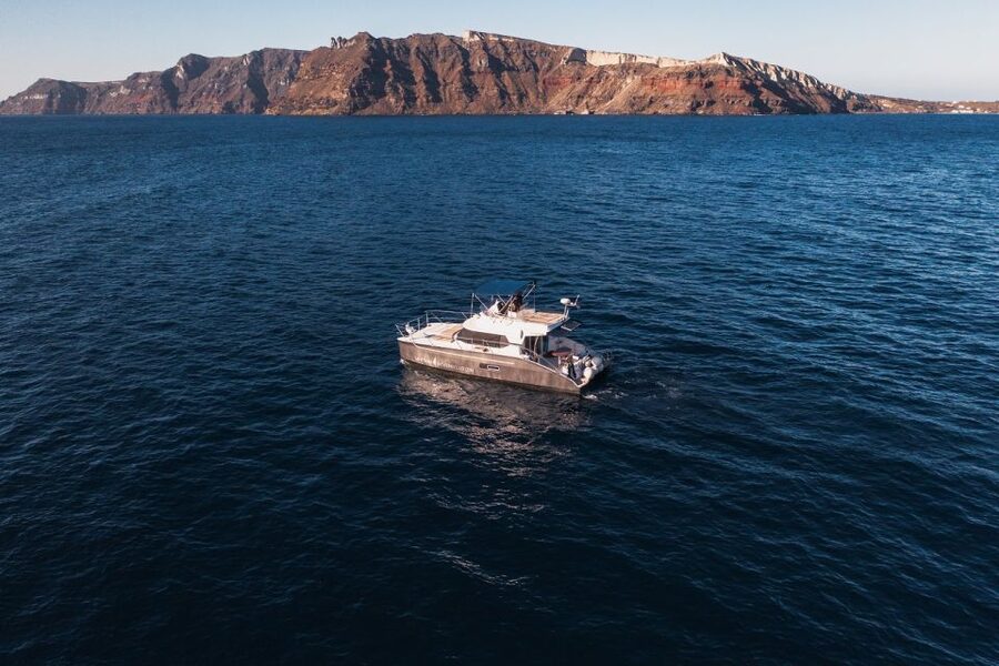 Santorini: Caldera Private Power Catamaran Cruise - White Beach, Mesa Pigadia, and Red Beach: Two Colors, One Useful Swim Strategy
