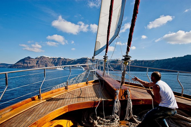 Santorini Caldera Sunset Sailing Cruise with Dinner and Wine - Stop 1: Santorini Volcano hike, steam vents, and the €5 entrance fee