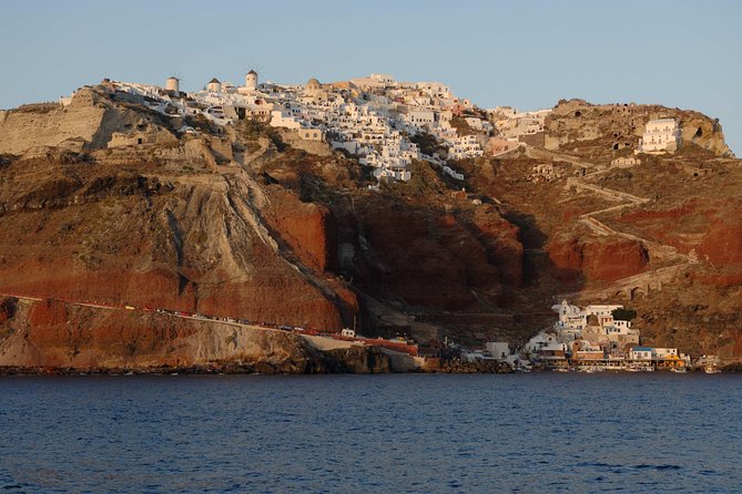 Santorini Caldera Sunset Sailing Cruise with Dinner and Wine - Stop 3 near Thirassia Bay: your Greek buffet dinner on board with wine
