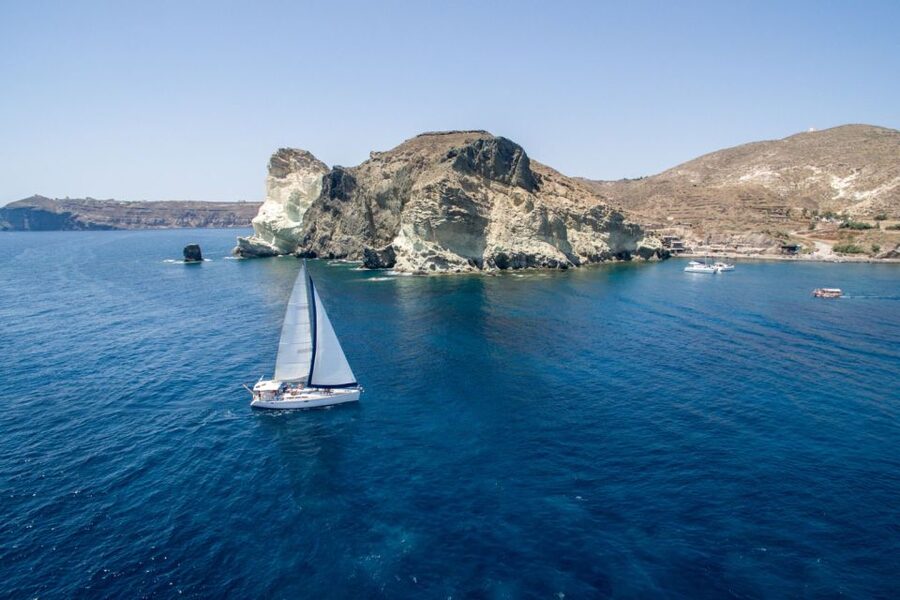 Santorini Caldera: Sunset Sailing Cruise with Meal - Getting There: Vlychada Marina Pickup, Bus Time, and Transfers