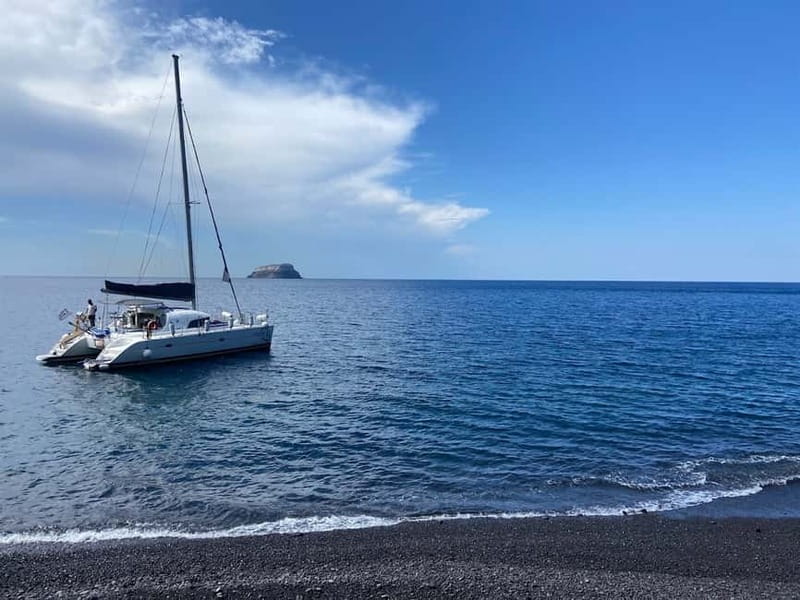 Santorini: Catamaran Cruise with Food and Drinks - Red Beach swim stop, then a quick White Beach photo moment