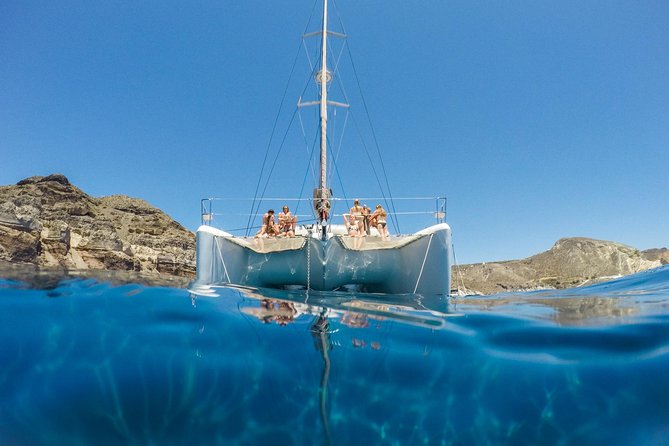 Santorini Catamaran Cruise with Fresh Meal and Open Bar - The Boat Setup: Small-Group Comfort, Sun Space, and Real Meal Service