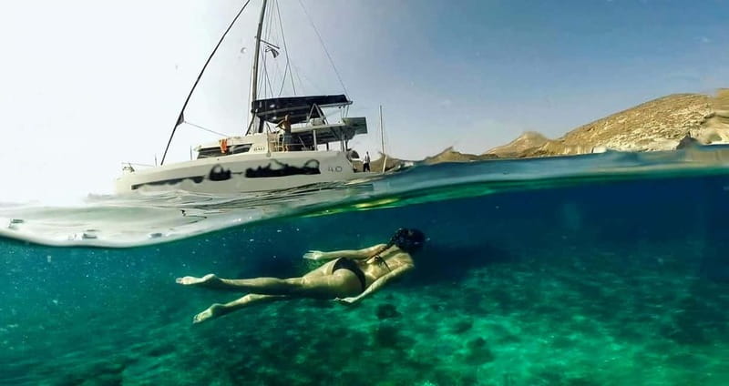 Santorini: Catamaran Cruise with Fresh Meal & Open Bar - From Red and White Beaches to the Black Mountain Coves