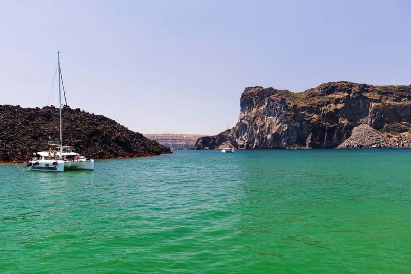 Santorini: Catamaran Cruise with Fresh Meal & Open Bar - Akrotiri Lighthouse and the View You Can Only Get From Sea Level