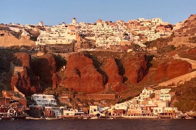 Santorini Catamaran Cruise with Greek Meal, Open-Bar and Sunset - Red Beach Swim Time, Anchoring in Deep Water, and Snorkeling Basics