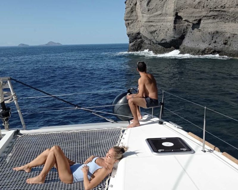 Santorini: Catamaran Cruise with Lunch, Drinks, & Oia Visit - Vlychada sunset stop: the Prosecco moment (on the afternoon cruise)