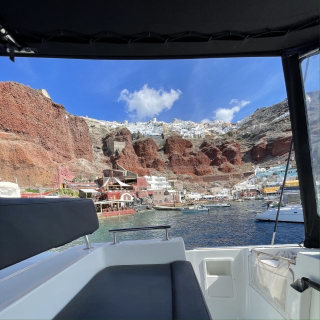 Santorini: Catamaran Cruise with Lunch, Drinks, & Oia Visit - The onboard meal: seafood, BBQ style, and drinks that keep the mood up