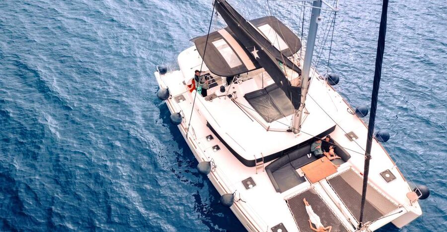 Santorini: Catamaran Cruise with Lunch, Drinks, & Oia Visit - Getting started: pickup from Thera or Oia, then a guided Oia moment