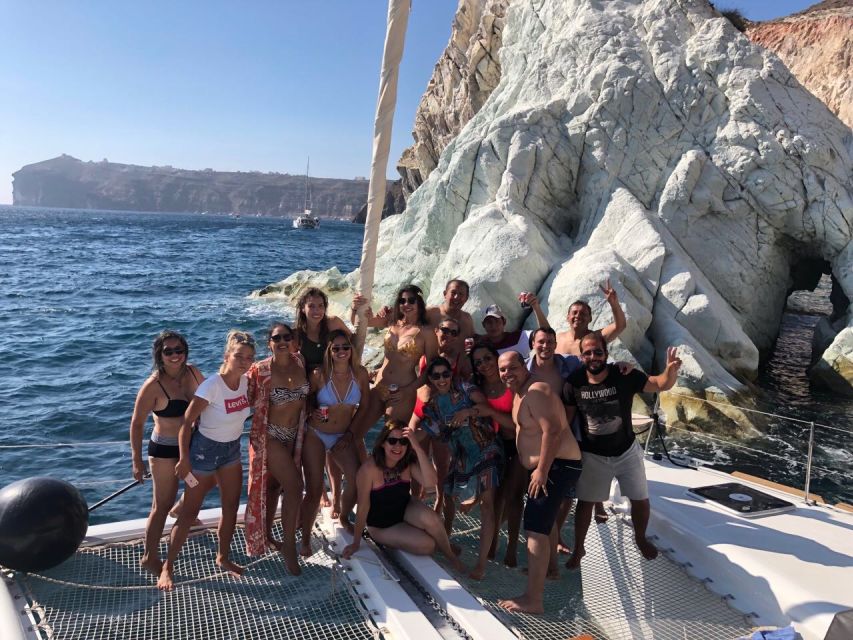 Santorini: Catamaran Cruise with Meal & Open Bar - Sunset and the Lighthouse Moment: The Caldera Looks Different From the Sea