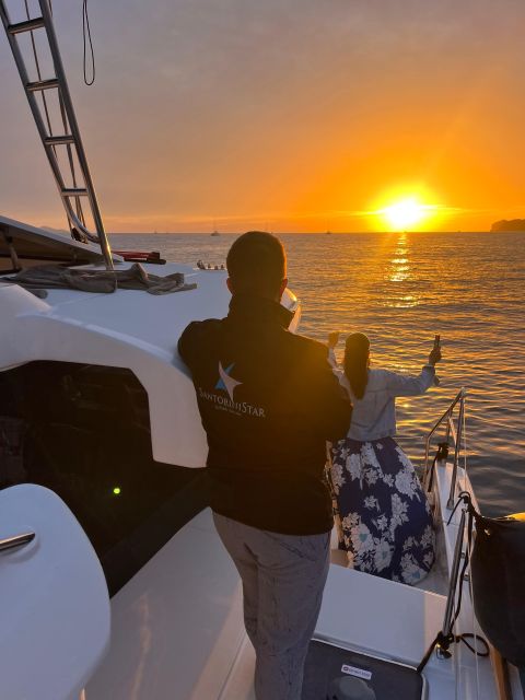 Santorini Catamaran Cruise with Swimming, Meal and Open Bar - Vlychada to Red Beach, the day kicks off with big Caldera energy
