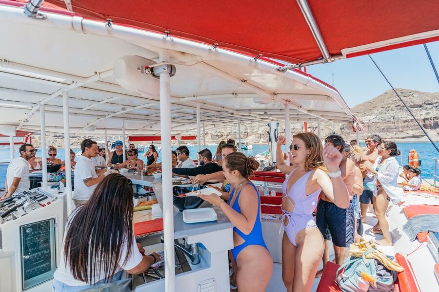 Santorini: Catamaran Tour with BBQ Dinner, Drinks, and Music - Red Beach and White Beach Swim Reality Check