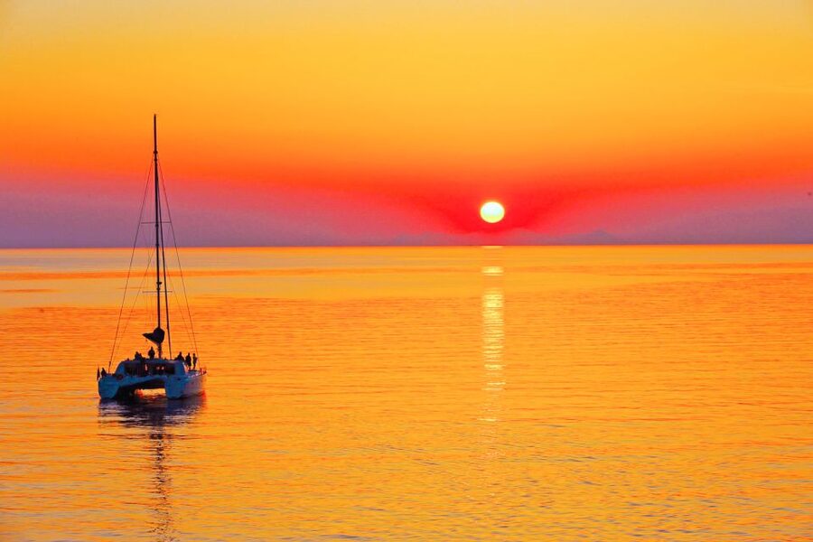 Santorini: Catamaran Tour with BBQ Meal and Unlimited Drinks - Red Beach Snorkeling, and What to Expect Underwater