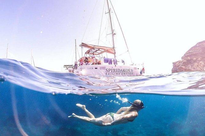 Santorini Classic Catamaran Cruise with BBQ, Drinks and Transfers - Stop 2: White Beach By Boat, Again, Photo Time Only