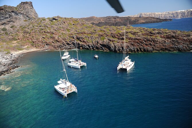 Santorini Classic Catamaran Cruise with BBQ, Drinks and Transfers - Swim Stop at Mesa Pigadia: Snorkel, Swim, and Relax for About 30 Minutes