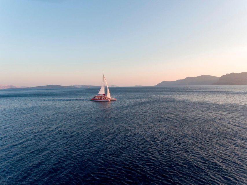 Santorini: Cruise Catamaran with BBQ & Drinks Day or Sunset - Key things I’d circle before you book