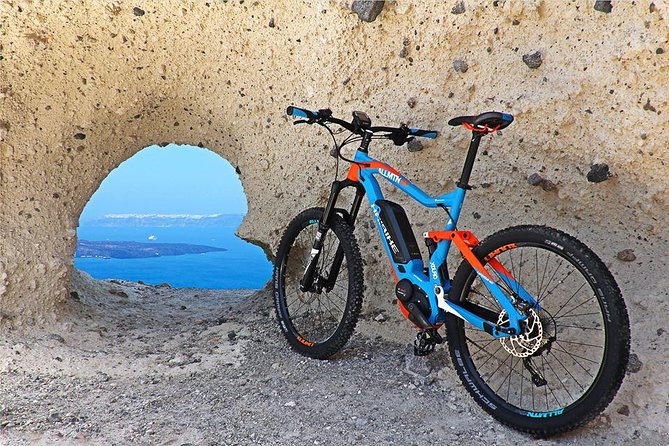Santorini E-bike Adventures - The Original Bike Tours - Emporio and the Stories Guides Tell on the Old Streets
