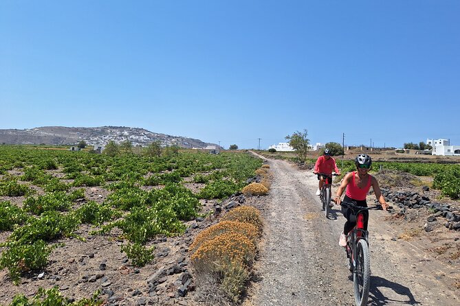 Santorini e-bike sunset tour experience - Vlychada Beach and Perivolos Black Sand: Short Stops, Big Visual Payoff
