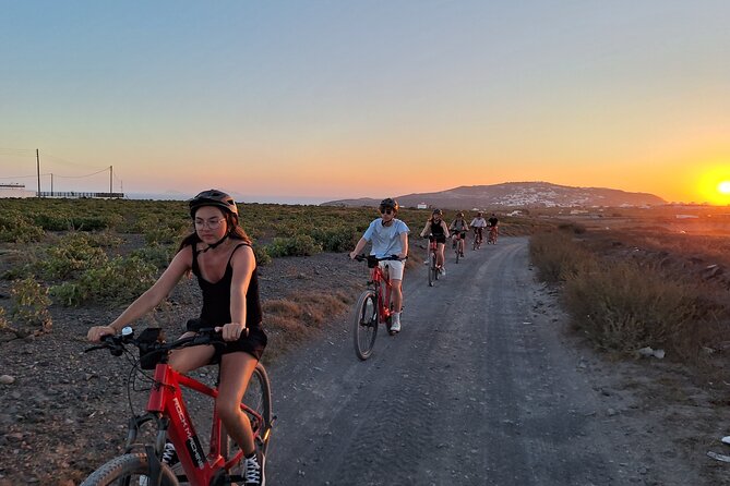Santorini e-bike sunset tour experience - Megalochori in the First Sunset Light, Then the Sea at the End