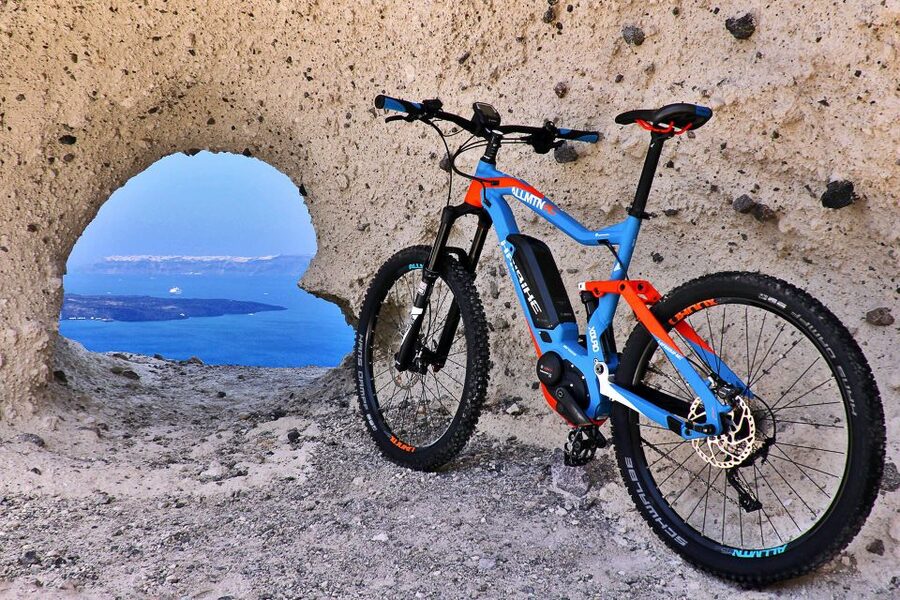Santorini: Electric Mountain Bike Adventure - Emporeio maze lanes and that orange juice stop