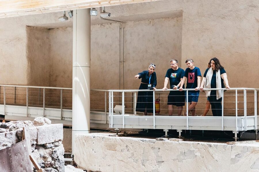 Santorini: Experience Akrotiri with a Licensed Tour Guide - Wall-painting photos and interior reconstructions you can actually understand