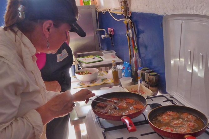 Santorini Family Farm Food & Wine Tour with Cooking Class - Guide style and the farm-to-village storytelling that makes it memorable