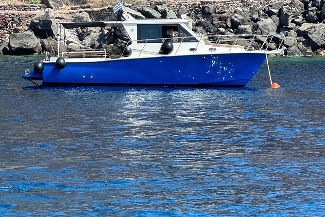 Santorini Fishing Private Cruise boat tour - BBQ, Snorkeling - From Ormos Ammoudiou to volcano waters: where the day gets interesting