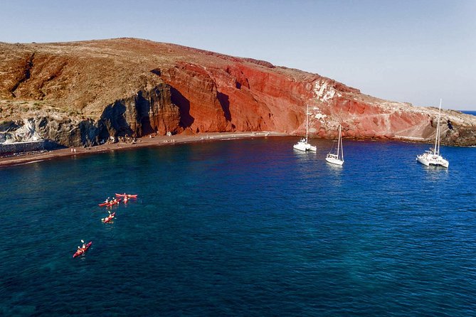 Santorini Guided Sea Kayaking with Light Lunch and Pick-up Option - Snorkeling time with included equipment