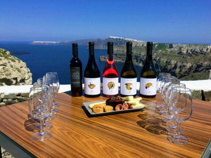 Santorini: Guided Tour to 3 Wineries with Wine Tastings - Pickup in Thera: how the van ride sets the tone