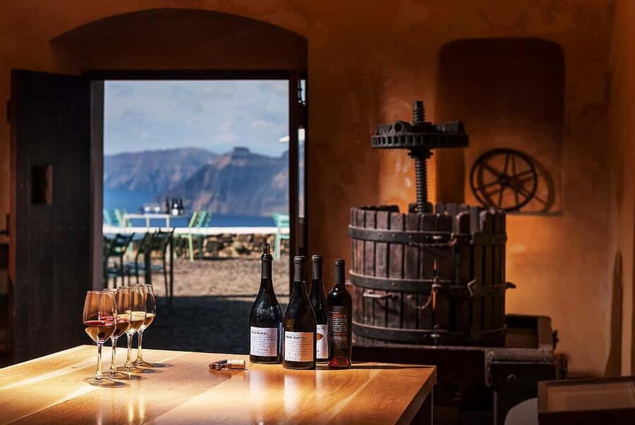 Santorini: Guided Wine Tour with Pickup and Snacks - Santorini wine tastes better when you understand the rocks