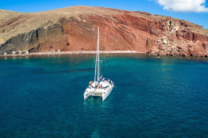 Santorini Half Day Catamaran Private Cruise incl. Meal, Drinks & Free Transport - Pick-up timing by month, and the one timing rule to respect