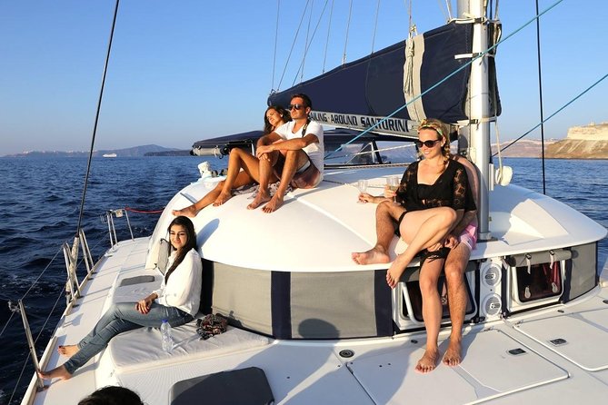 Santorini Half Day Catamaran Private Cruise incl. Meal, Drinks & Free Transport - Price of $506.85 per person, and what makes it feel fair