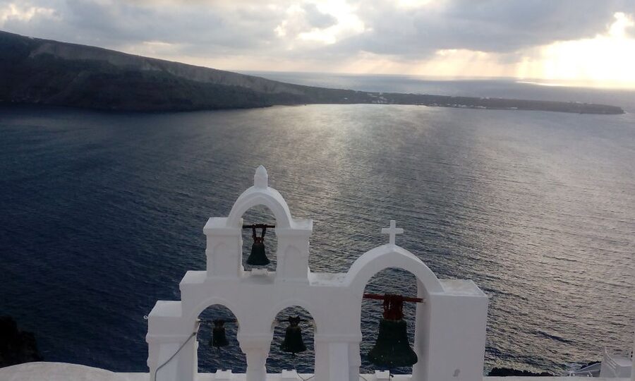 Santorini: Half-Day Sightseeing Tour with Hotel Pickup - Oia free time, castle corners, and the 3 bells photo moment
