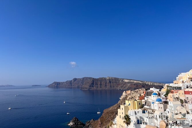 Santorini Highlights: Private Sightseeing Tour in Santorini - Oia: The first 45 minutes are all about blue domes and caldera drama