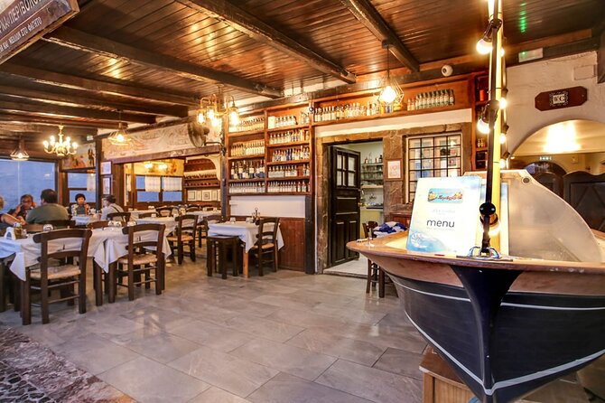 Santorini Highlights Small-Group Tour with Authentic Greek Lunch - Perivolos Black Beach and the Included Greek Lunch