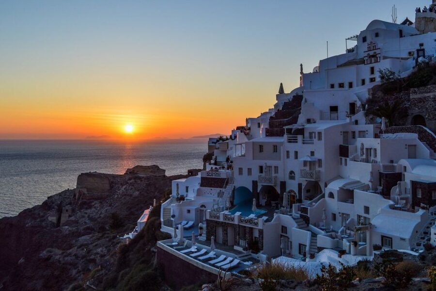 Santorini Island Bus Tour and Caldera Sunset Cruise - Athinios to Nea Kameni: riding toward an active crater