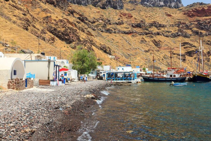Santorini Island Bus Tour and Caldera Sunset Cruise - Thirasia and Manola: beach time, old staircases, and a key schedule note
