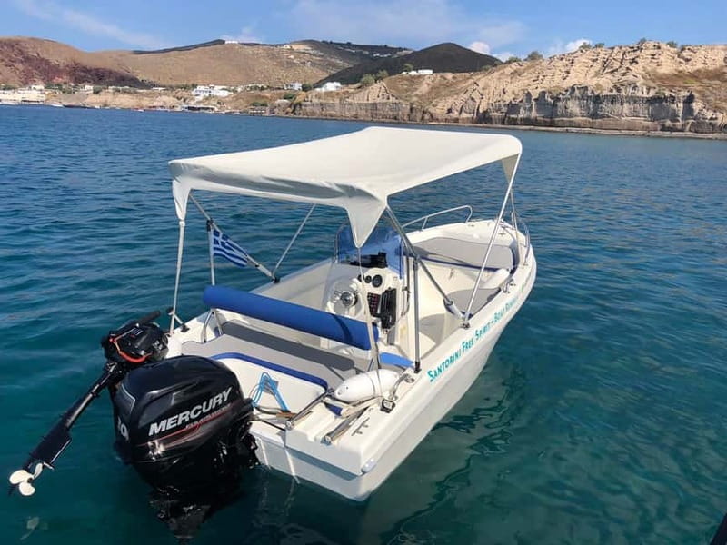 Santorini: License-Free Boat Rental with Ice, Water, & Fruit - Steering inside the caldera: the sea-crater feeling you can actually control
