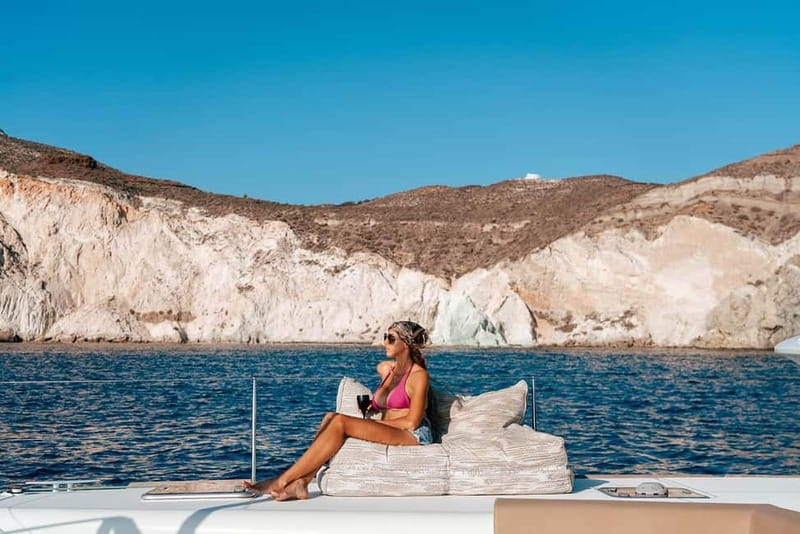 Santorini: Luxury Catamaran Cruise with Lunch, BBQ & Drinks - Red Beach, White Beach, and the Akrotiri Lighthouse photo moments