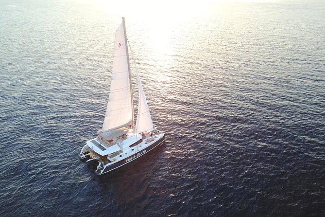 Santorini Luxury Catamaran Day Cruise with BBQ,drinks,transfer - Getting picked up, shoes off, and finding the boat without stress
