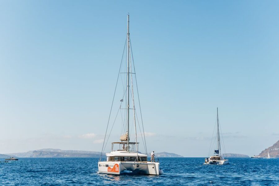 Santorini: Luxury Catamaran Day Trip with Meal and Open Bar - Luxury catamaran on Santorini: what makes it feel different