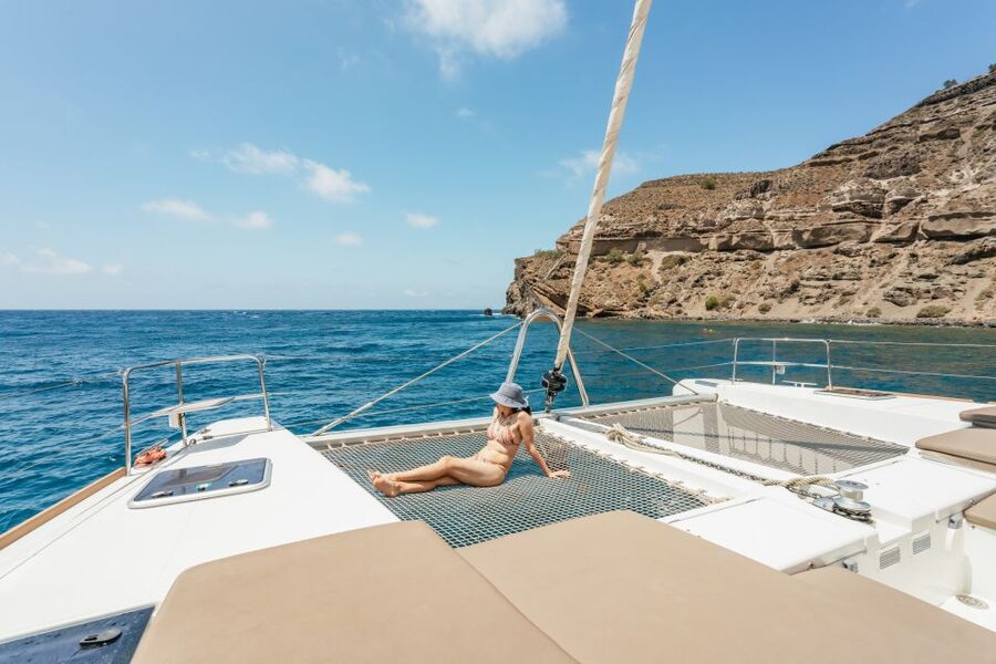Santorini: Luxury Catamaran Day Trip with Meal and Open Bar - The route that matters: Red Beach, White Beach sea caves, and hot springs