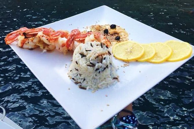 Santorini Luxury Catamaran Sunset Cruise with BBQ, Drink and Transfer - The Ipanema 58 setup: small-group comfort and onboard basics