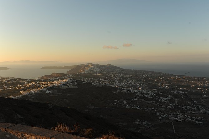 Santorini Luxury Custom Private Tour with Local guide - Oia in 1 hour 20 minutes: blue domes, cobblestones, and caldera views