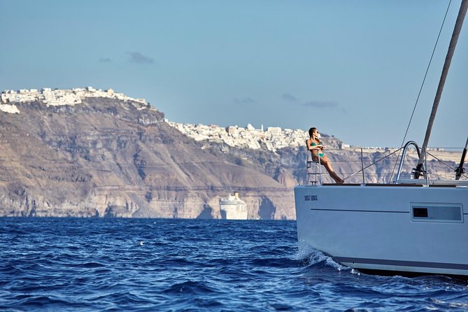 Santorini Luxury Sailing Catamaran Cruise with BBQ, Drinks and Transfer - Boat Comfort, Rules, and That Crew Energy