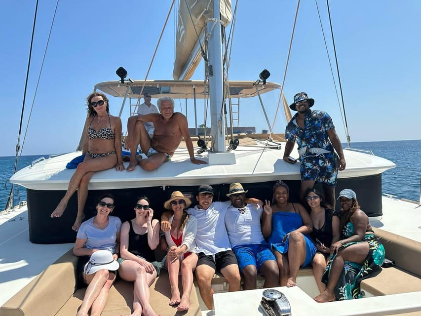 Santorini: Luxury Sunset Cruise with Dinner, BBQ, and Drinks - Crew That Makes It Feel Smooth: Natalia, Helen, Atila, Christina, and the Photo Help