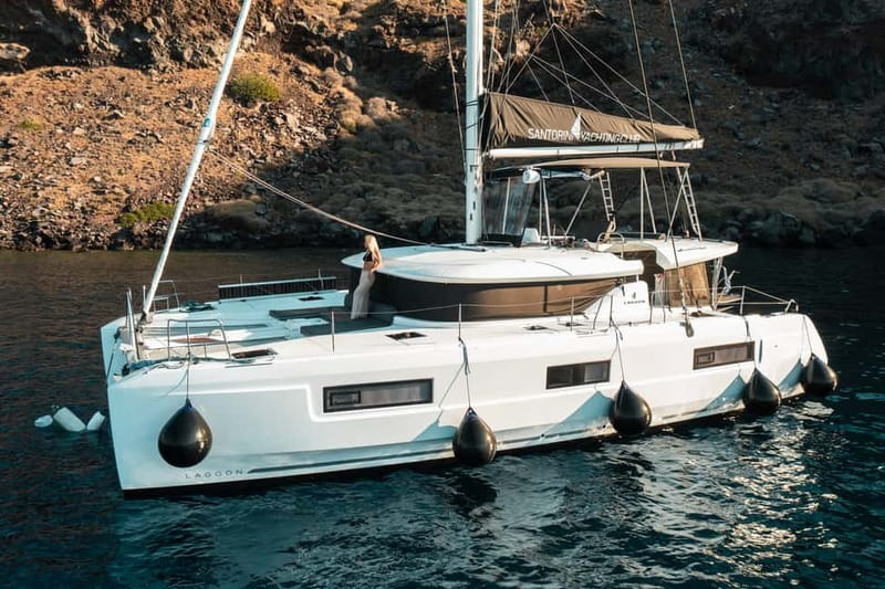 Santorini: Majestic Catamaran Cruise with Meal and Drinks - Unmanned Volcanic Beaches, Deck Time, and the Heat of Choice