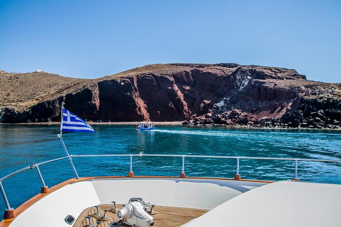 Santorini: Motor Yacht Private Cruise with 5-Course Meal - Volcanic swimming and snorkeling: Volcano and Mesa Pigadia anchor breaks