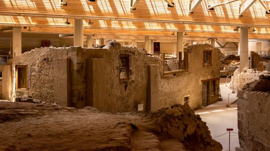 Santorini: Mythical Day Trip to Akrotiri with Volcano Cruise - Akrotiri Prehistoric City: Ash-Covered Streets and a Guided Story